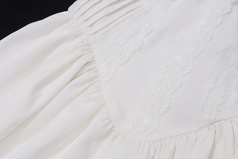 Vestido Mini Plissado Off-Shoulder.