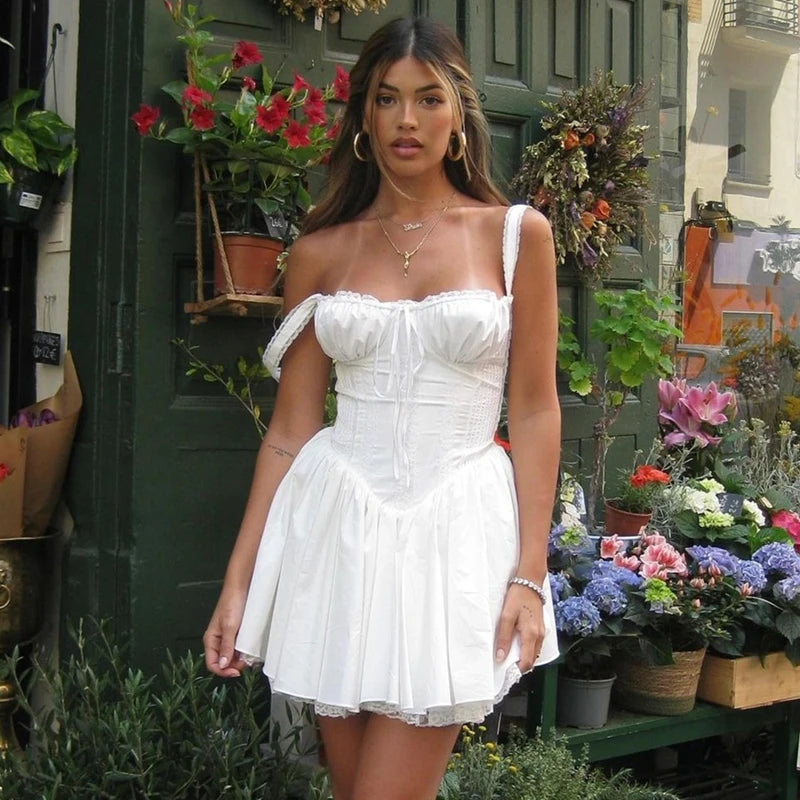Vestido Mini Plissado Off-Shoulder.