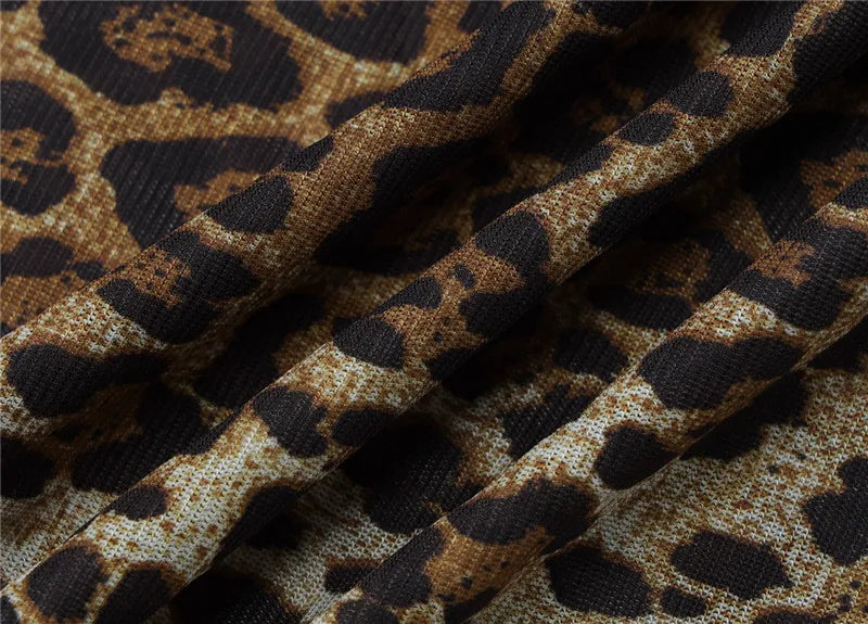 Conjunto Wild Nights – Body de Alça + Calça Flare em Tule Animal Print.